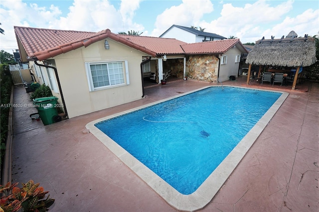 view of pool featuring a gazebo and a patio