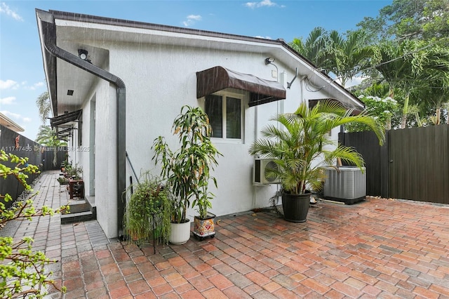 2550 SW 68th Ave, Miami, FL 33155 - exterior space featuring central AC and a patio
