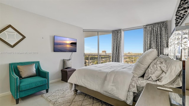 bedroom with expansive windows