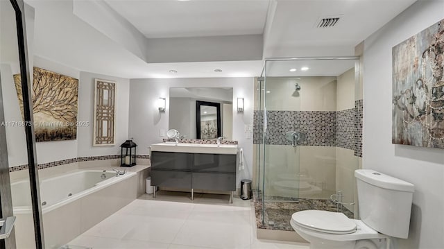 full bathroom featuring tile patterned flooring, vanity, toilet, and independent shower and bath