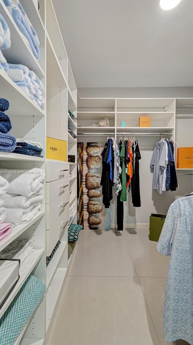 walk in closet featuring tile patterned floors