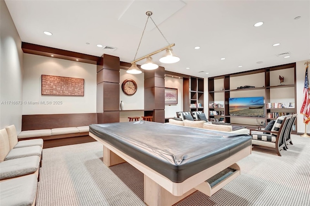 playroom with light colored carpet and pool table