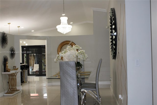 dining area featuring a chandelier, lofted ceiling, and ornamental molding