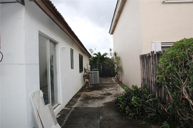 view of property exterior with central air condition unit