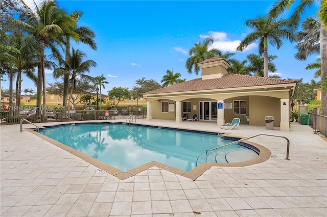 view of swimming pool featuring a patio