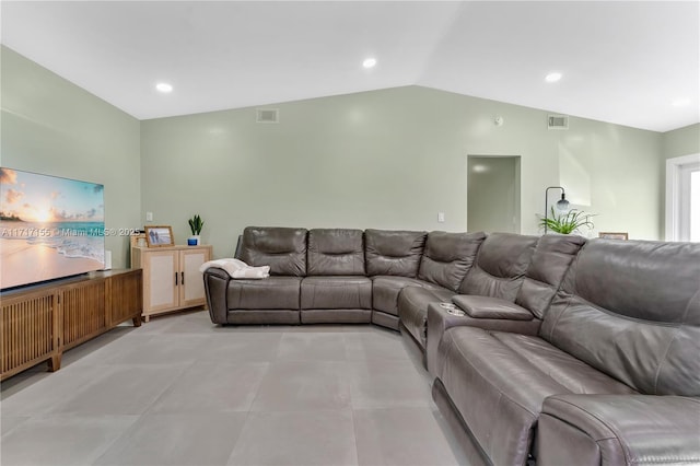 living room featuring vaulted ceiling