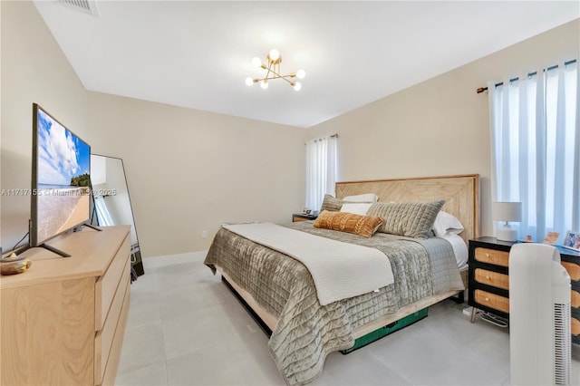 bedroom with a chandelier