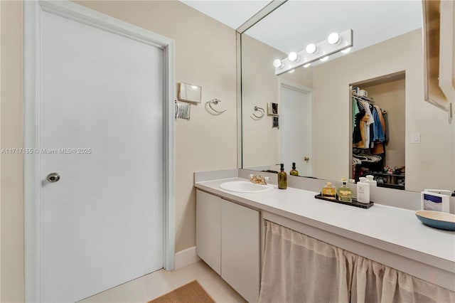 bathroom featuring tile patterned floors and vanity