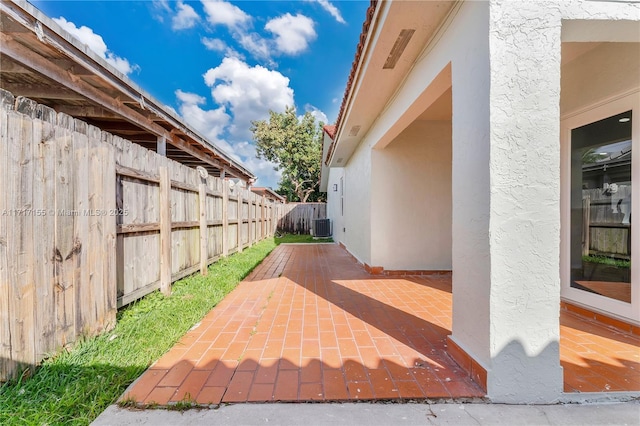 view of patio / terrace with central AC unit