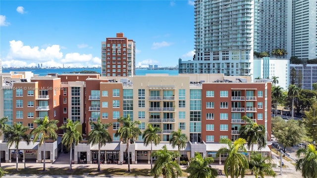 view of property with a water view