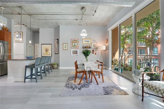 dining area featuring light hardwood / wood-style floors