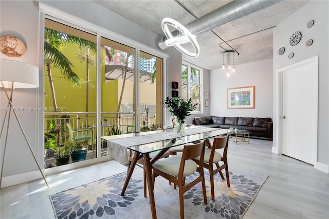 dining space featuring light hardwood / wood-style floors