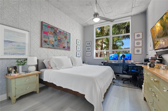 bedroom with light hardwood / wood-style floors