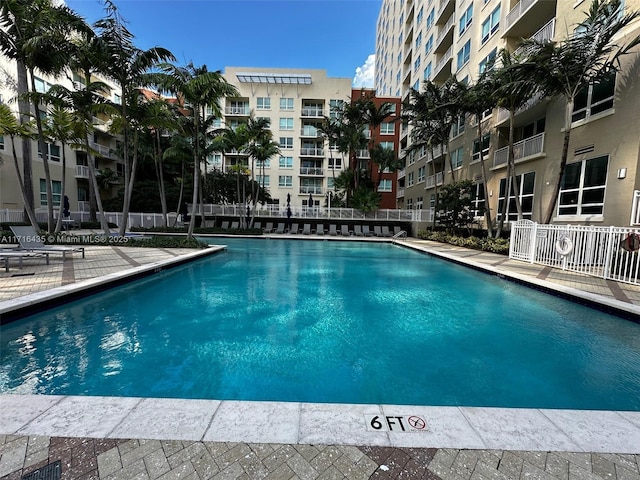 view of swimming pool featuring a patio