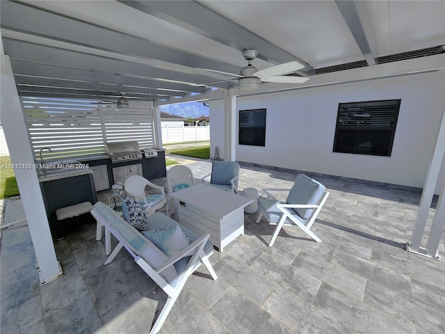 view of patio with a grill and outdoor lounge area