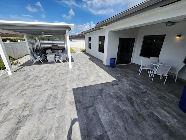 deck featuring outdoor lounge area and a patio