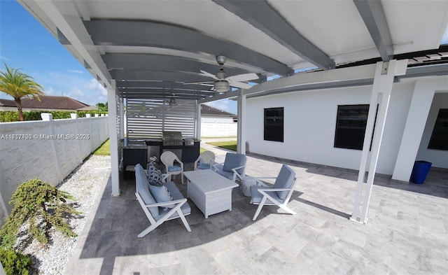 view of patio with ceiling fan