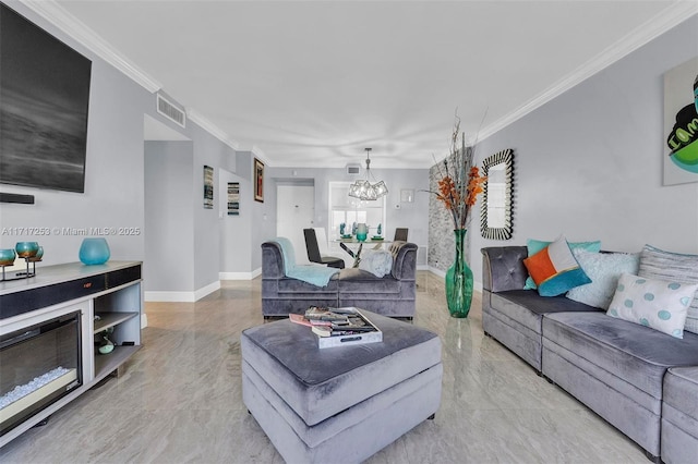 living room with crown molding and a notable chandelier