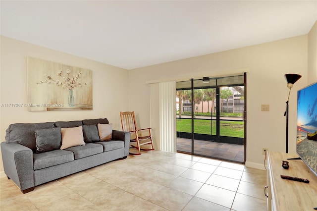 living room with light tile patterned floors