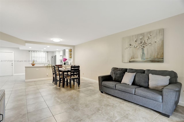 living room featuring light tile patterned flooring