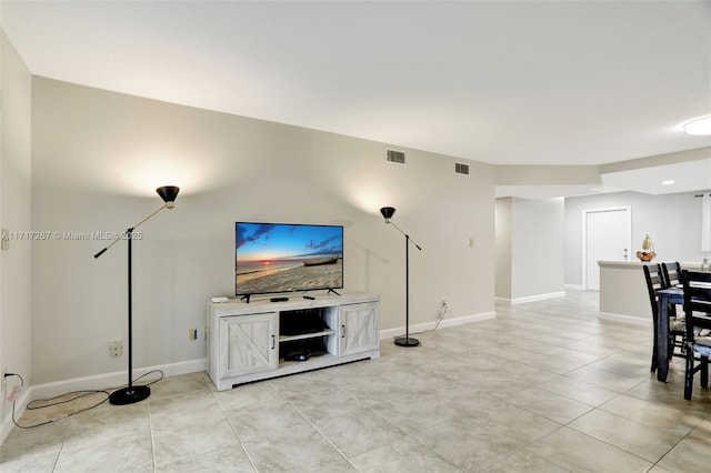 living room featuring light tile patterned floors