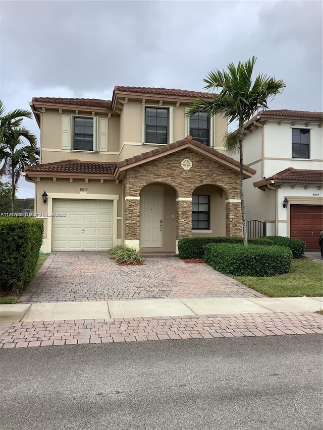 view of front of house with a garage