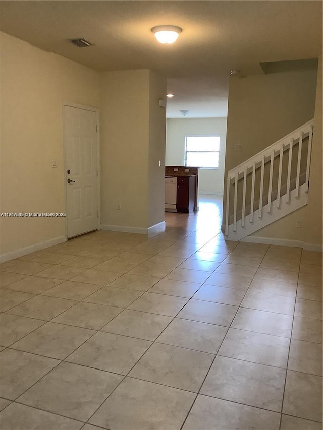 view of tiled spare room