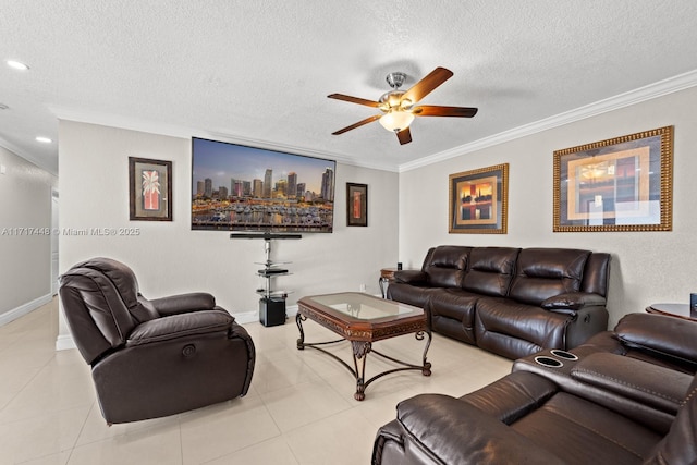 tiled living room featuring crown molding, ceiling fan, and a textured ceiling