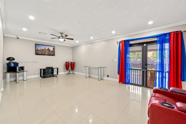 interior space with tile patterned flooring, ceiling fan, and crown molding