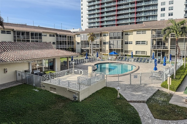 view of swimming pool featuring a patio area