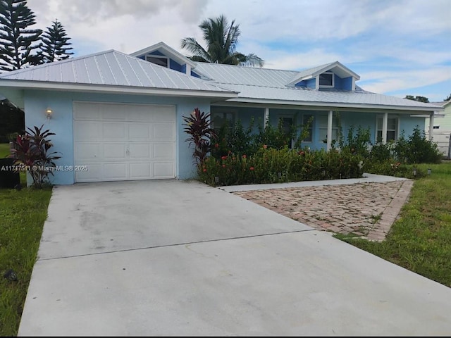 single story home with a garage