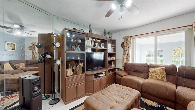 living room with a textured ceiling