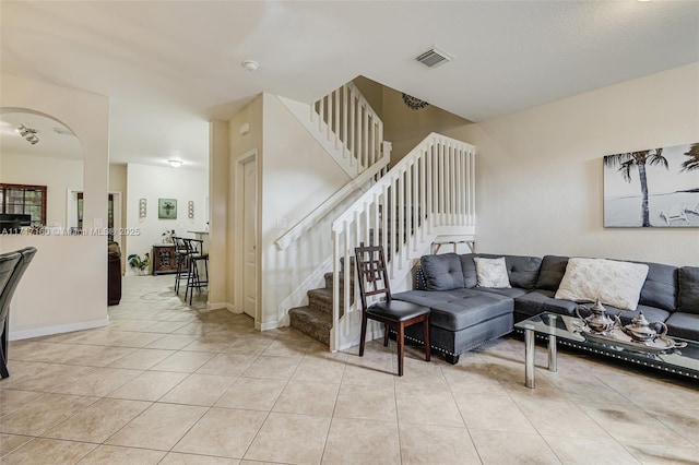 living room featuring light tile patterned floors