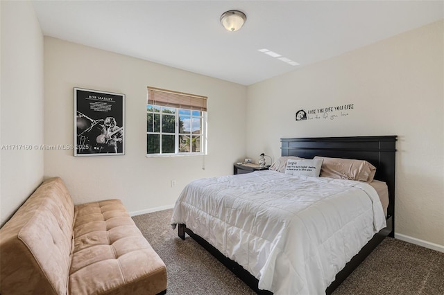 bedroom with dark carpet