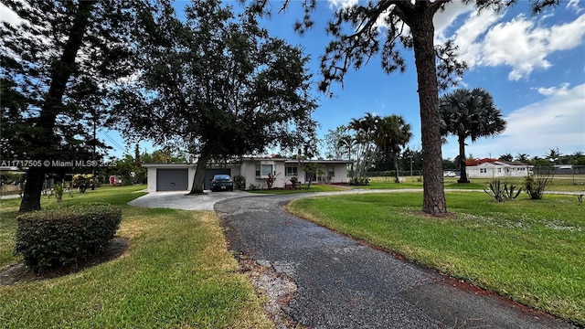 view of front facade with a front yard