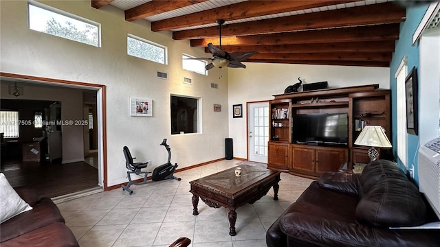 living room featuring ceiling fan, beam ceiling, light tile patterned flooring, and wooden ceiling