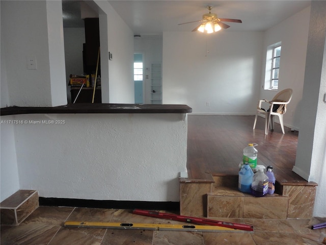 kitchen featuring ceiling fan