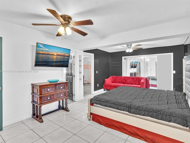 bedroom featuring ceiling fan and light tile patterned floors