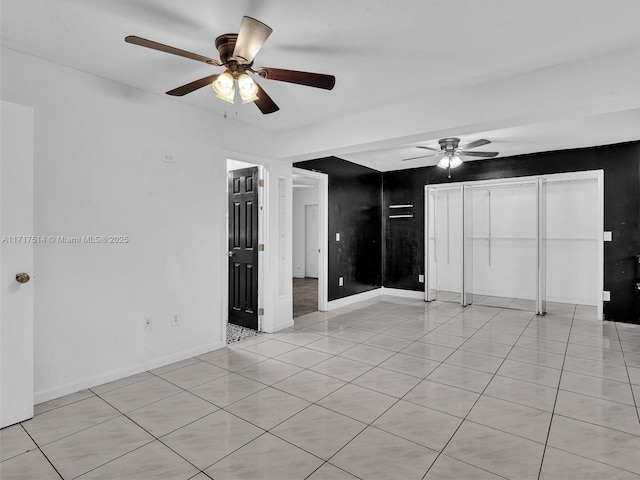 521 SW 68th Ter, Pembroke Pines, FL 33023 - unfurnished room featuring a ceiling fan, light tile patterned floors, and baseboards
