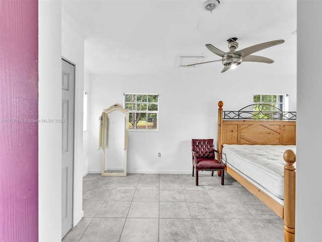 bedroom with light tile patterned floors and ceiling fan