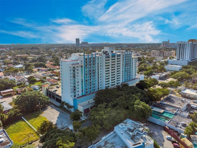 birds eye view of property featuring a city view