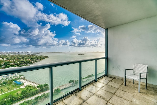 balcony featuring a water view