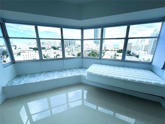 unfurnished bedroom featuring tile patterned flooring