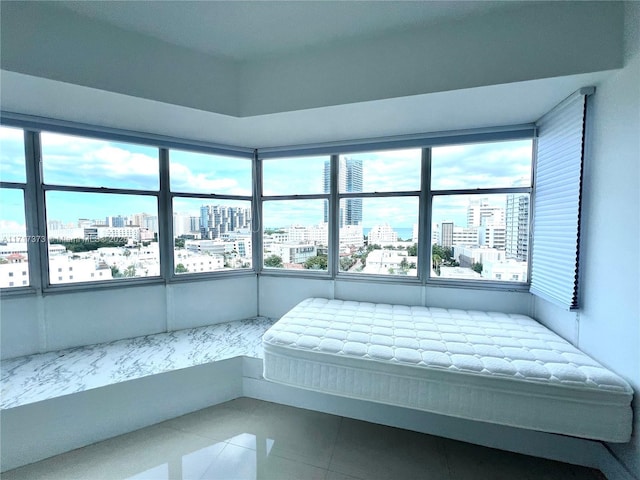 bedroom featuring tile patterned floors