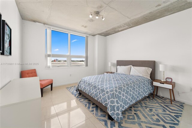 bedroom featuring tile patterned floors