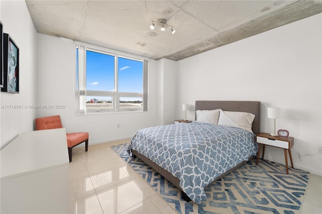 bedroom featuring light tile patterned floors