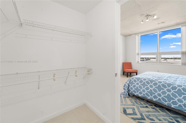 bedroom with tile patterned floors