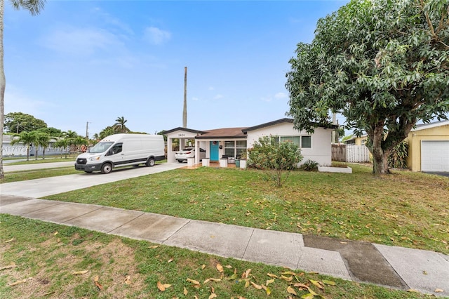 ranch-style house with a front lawn