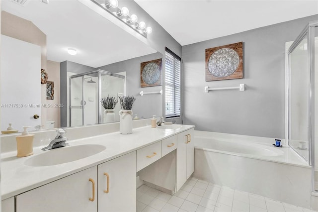 bathroom with tile patterned floors, plus walk in shower, and vanity