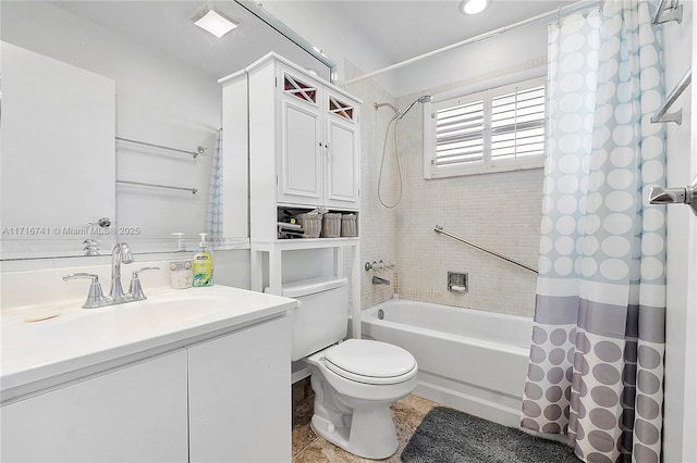 full bathroom with shower / bath combo with shower curtain, vanity, and toilet